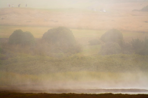 Fog shrouds golfers at Bodega Bay